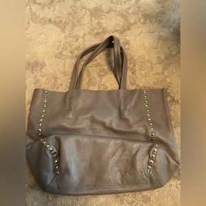 Grey soft leather handbag. Both bags have a removable interior section